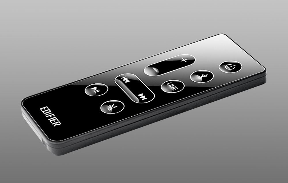 Black Edifier remote for speakers on a gray background