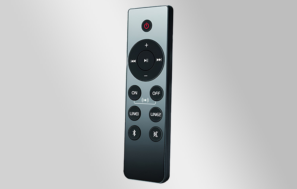 Remote for speakers on gray background