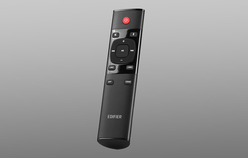 black Edifier remote for speakers on gray background