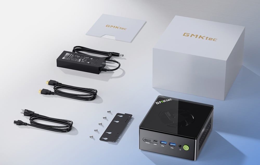 Set with mini PC, cables, user manual and mounting accessories
